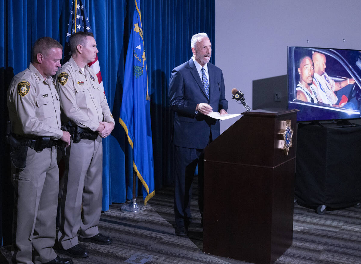 Clark County District Attorney Steve Wolfson, right, speaks about the indictment of Duane &quot ...