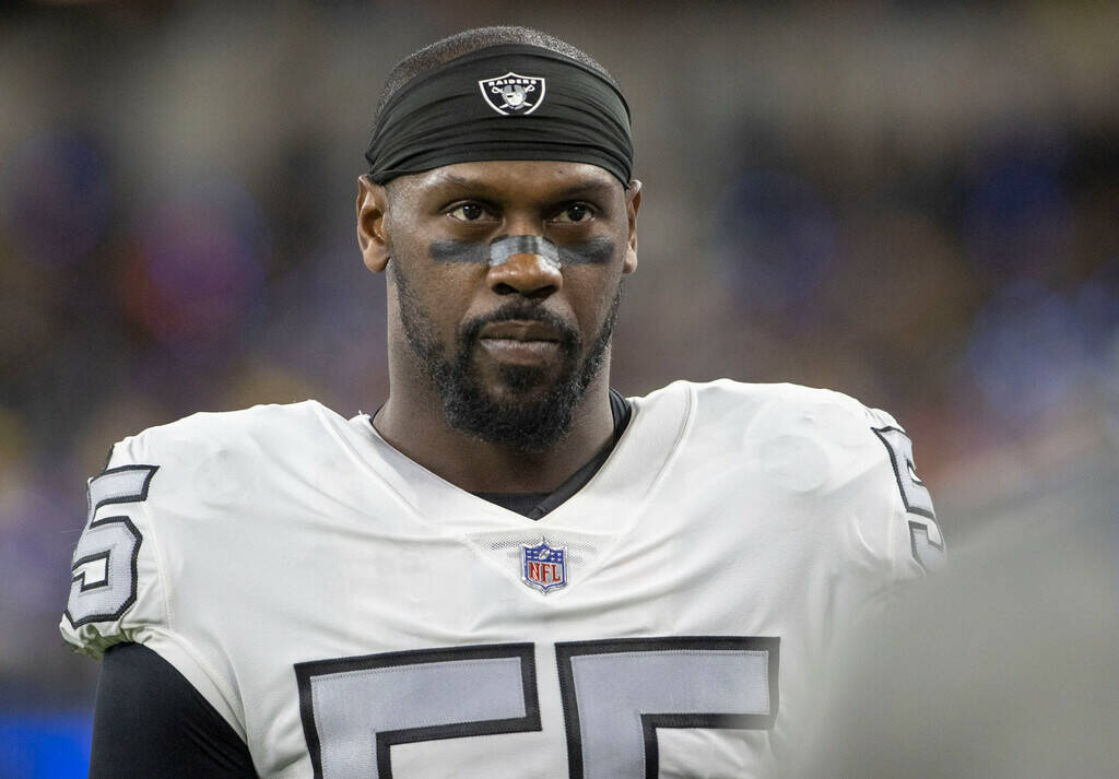 Raiders defensive end Chandler Jones (55) waits on the sideline before an NFL game against the ...
