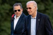FILE - President Joe Biden, and his son Hunter Biden arrive at Fort McNair, June 25, 2023, in W ...