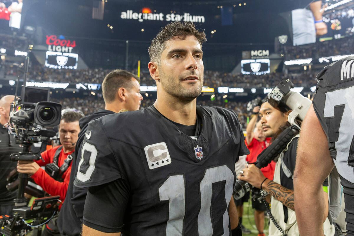 Las Vegas Raiders quarterback Jimmy Garoppolo (10) walks off the field after the Raiders' 23-18 ...