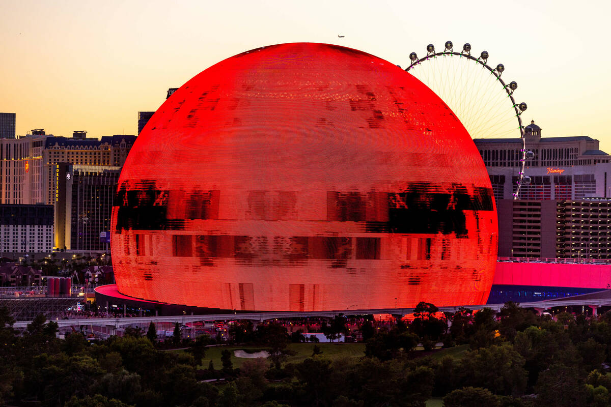 Varied colors of red graphic during the opening night of the Sphere with U2 concert on stage Fr ...