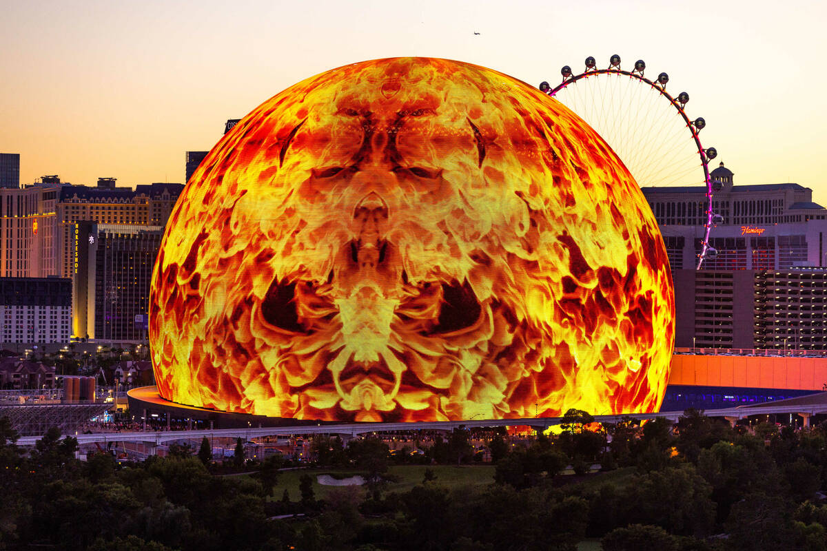A flaming ball graphic during the opening night of the Sphere with U2 concert on stage Friday, ...