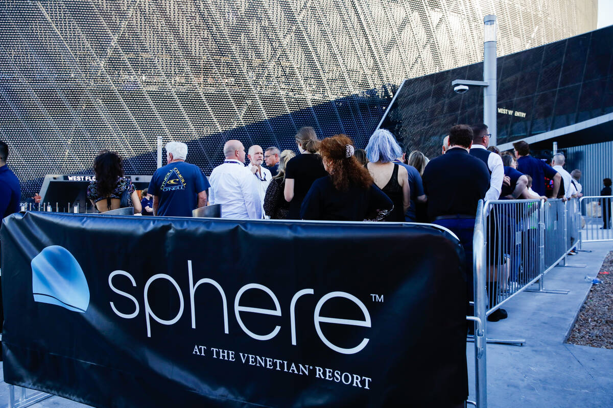 Excited fans wait outside of the Sphere on the night of its inaugural performance featuring U2 ...