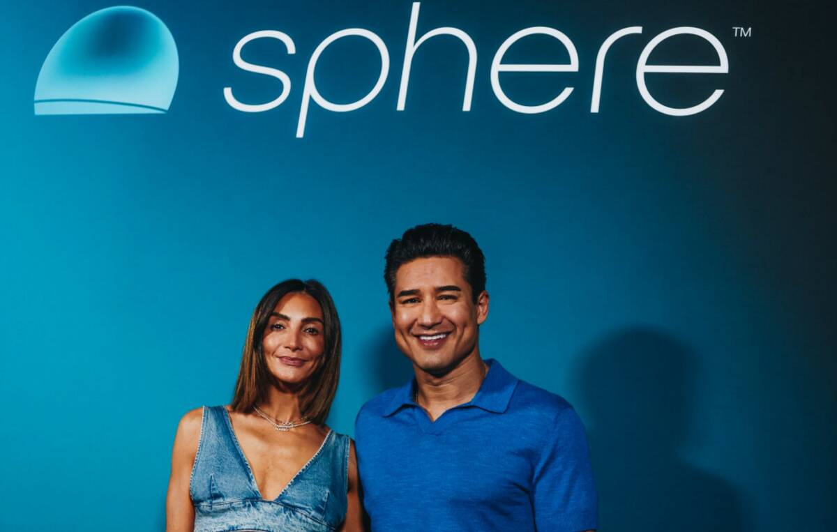Mario Lopez, right, poses with his wife, Courtney Mazza, outside of the Sphere during its openi ...