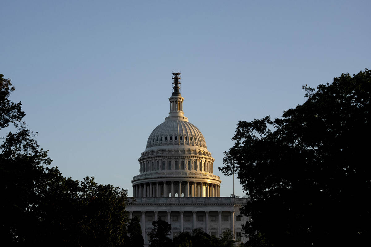 The Dome of the U.S. Capitol Building at sunset seen from Upper Senate Park in Washington, Wedn ...