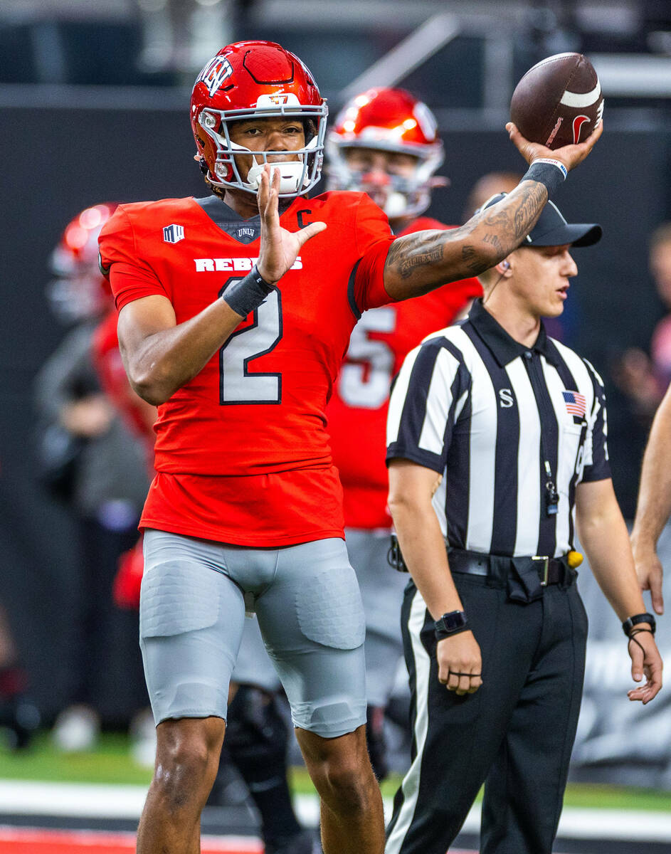 UNLV quarterback Doug Brumfield (2) tosses a pass in warmups before the first half of their NCA ...
