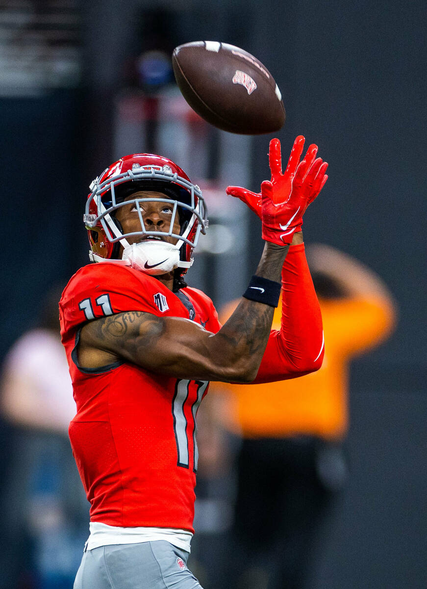 UNLV wide receiver Ricky White (11) catches a pass in warmups before the first half of their NC ...