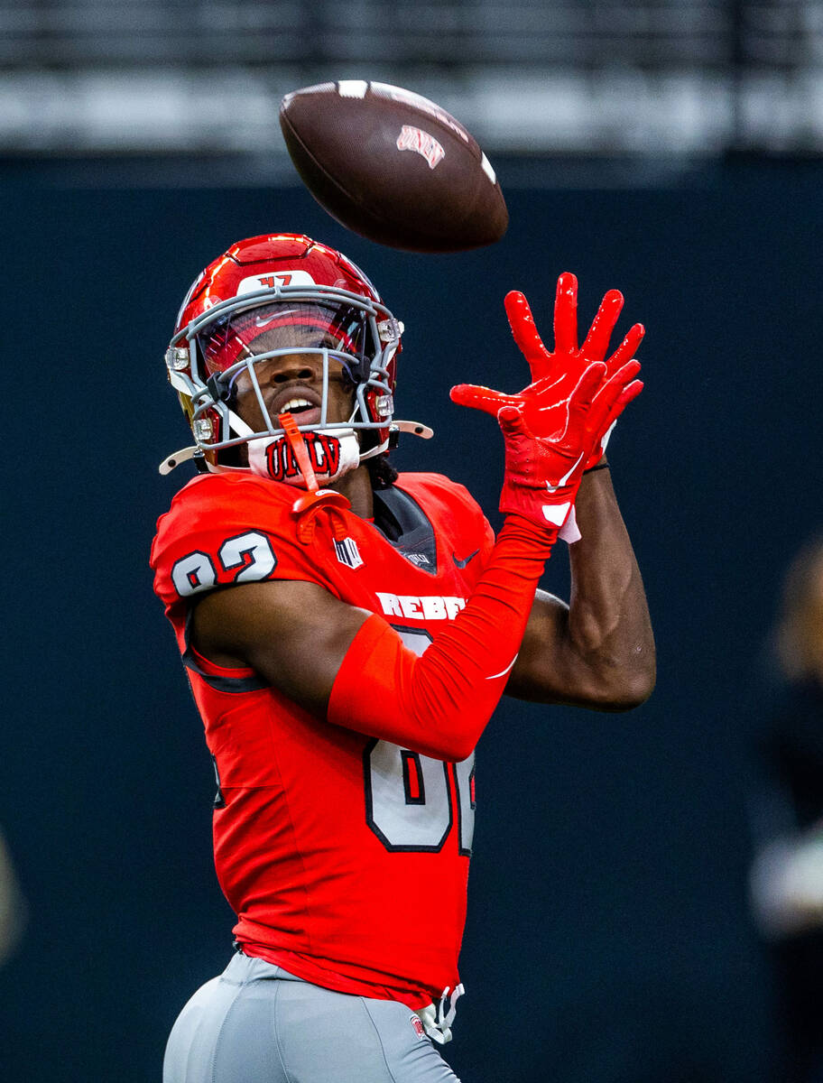 UNLV wide receiver Rashawn Jackson (82) catches a pass in warmups before the first half of thei ...