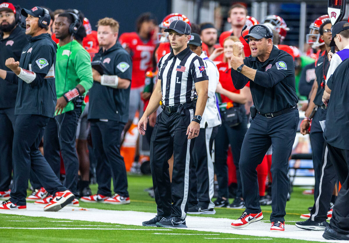 UNLV Head Coach Barry Odom wants a holding call against Hawaii during the first half of their N ...