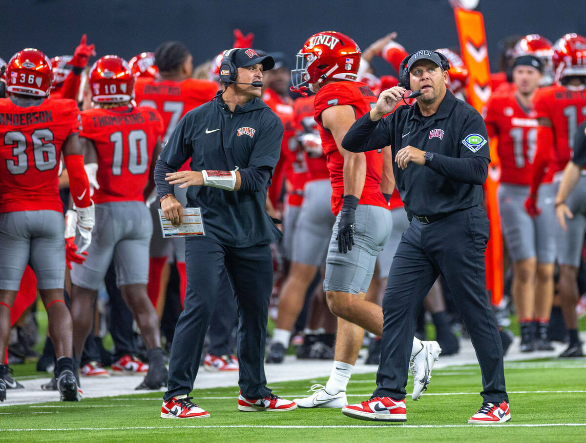 UNLV Head Coach Barry Odom looks to the scoreboard after another turnover from Hawaii during th ...