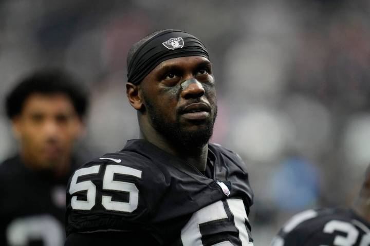 Raiders defensive end Chandler Jones warms up before an NFL game against the New England Patrio ...