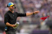 Los Angeles Chargers head coach Brandon Staley throws a challenge flag during the first half of ...