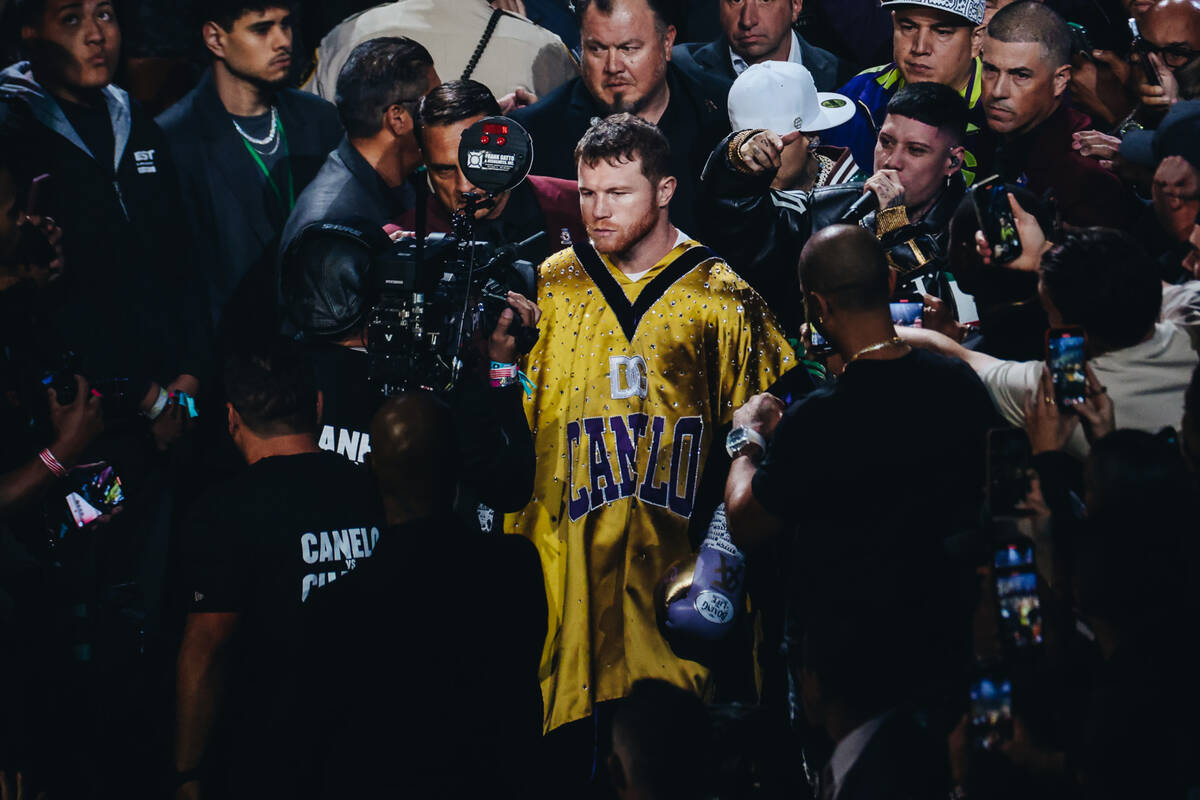 Canelo Alvarez makes his grand entrance during an undisputed world super middleweight title box ...