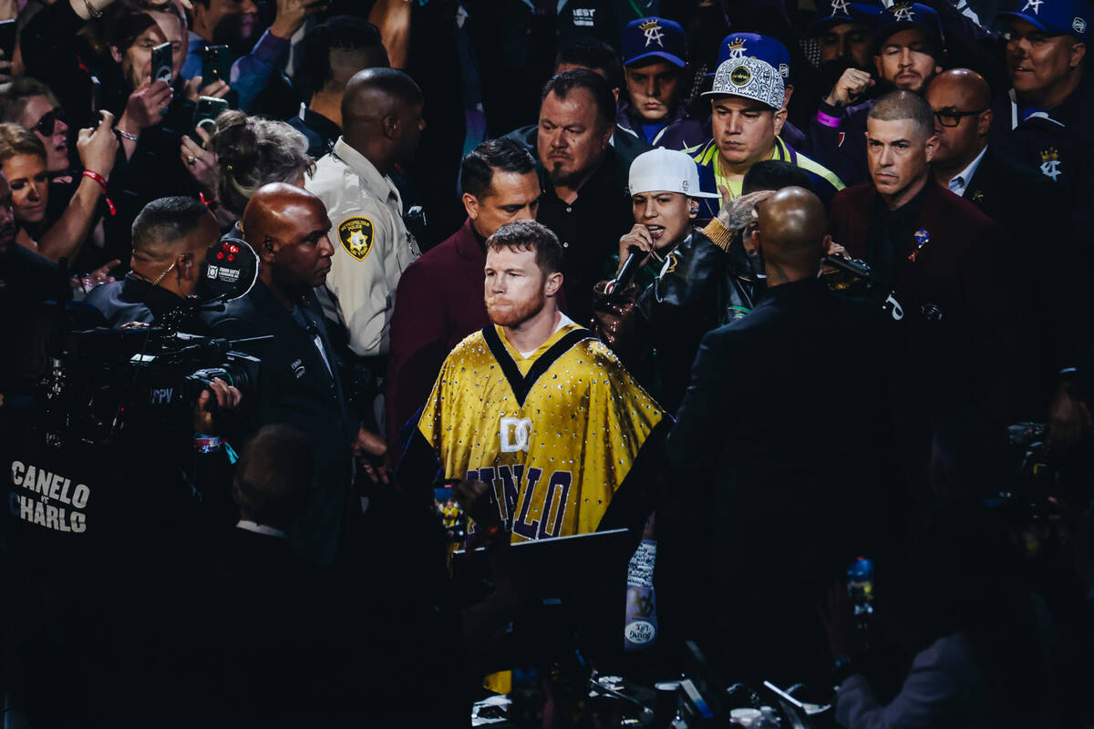 Canelo Alvarez makes his grand entrance during an undisputed world super middleweight title box ...