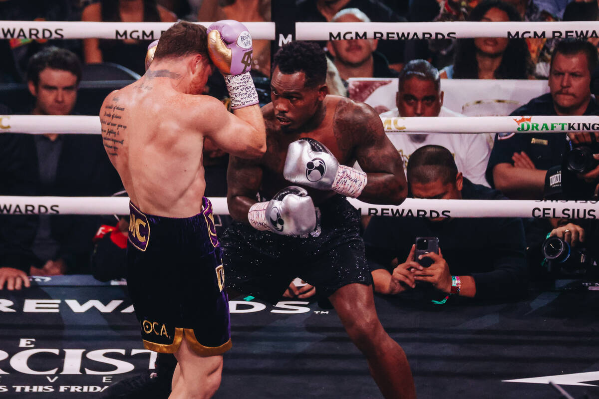 Canelo Alvarez and Jermell Charlo box during an undisputed world super middleweight title boxin ...