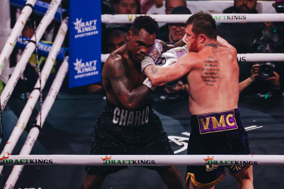 Canelo Alvarez and Jermell Charlo box during an undisputed world super middleweight title boxin ...