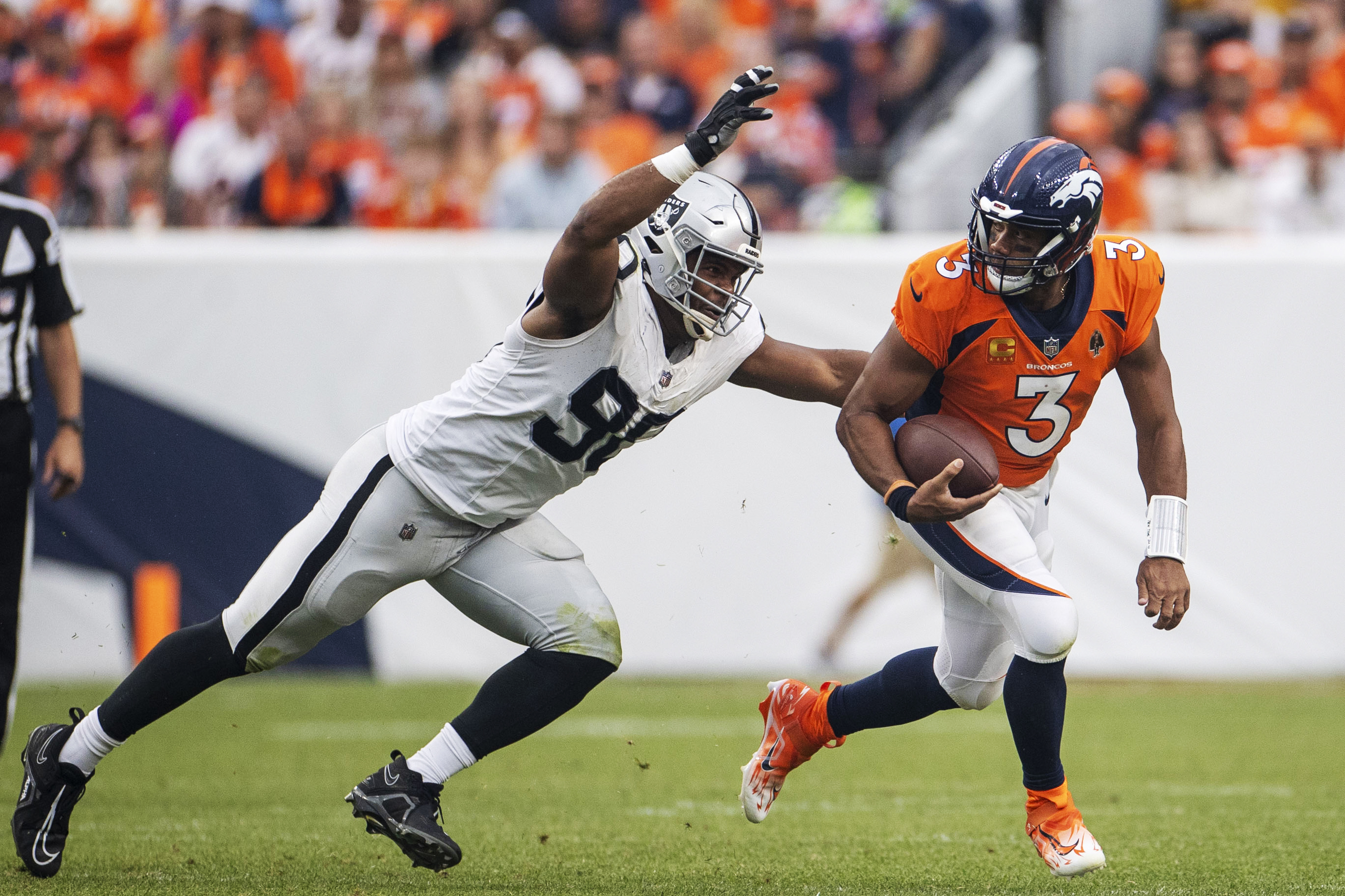 In Broncos' loss to Raiders, QB Russell Wilson shows improvement