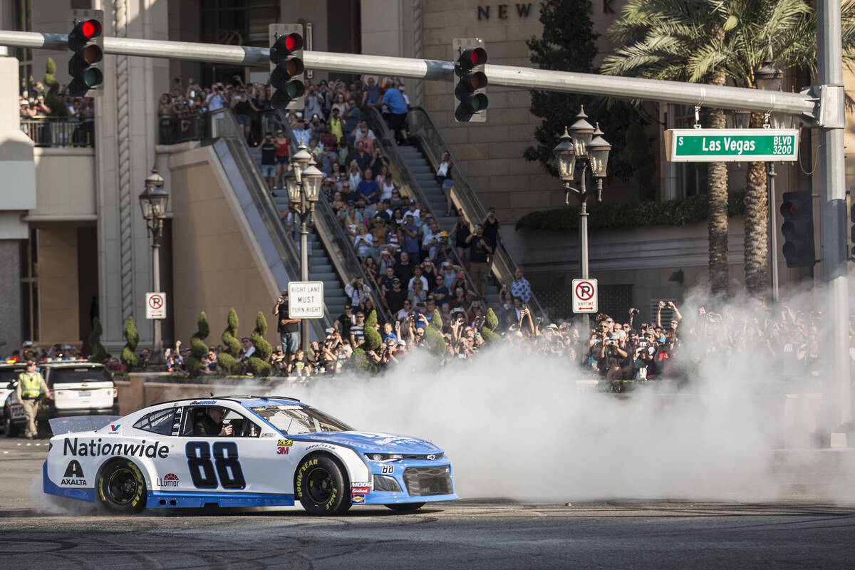 Alex Bowman does a burnout at the intersection of East Sands Avenue and South Las Vegas Bouleva ...
