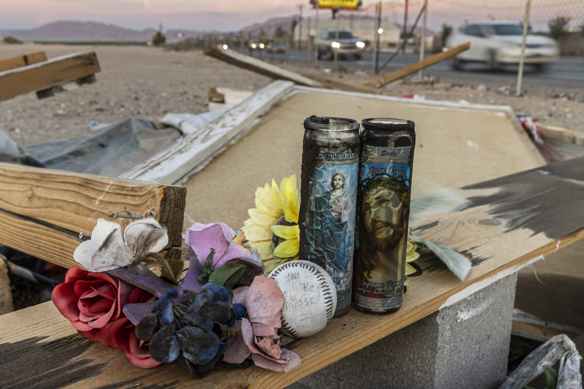 The remains of a vigil from a car crash that killed nine people at North Commerce Street and We ...
