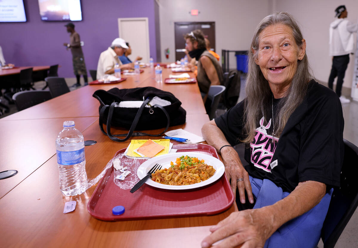 Brenda Cole, 71, eats during the community meal at Catholic Charities of Southern Nevada in Las ...