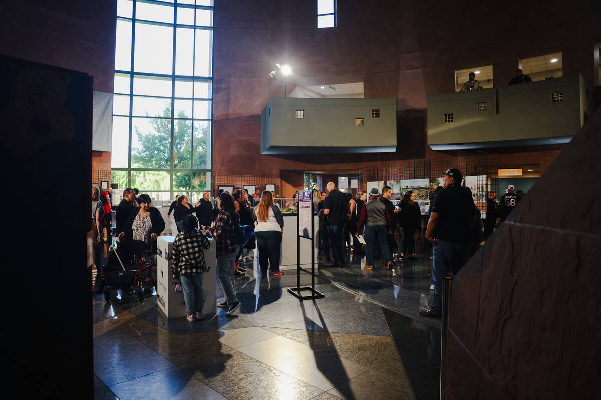 People gather following the 1 October Sunrise Remembrance ceremony at the Clark County Governme ...