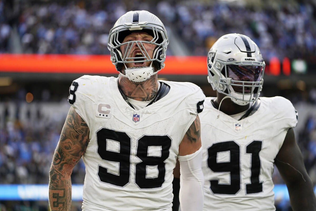 Las Vegas Raiders defensive end Maxx Crosby (98) celebrates after stopping Los Angeles Chargers ...