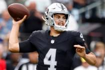 Raiders quarterback Aidan O'Connell (4) throws a pass during the second half of an NFL preseaso ...