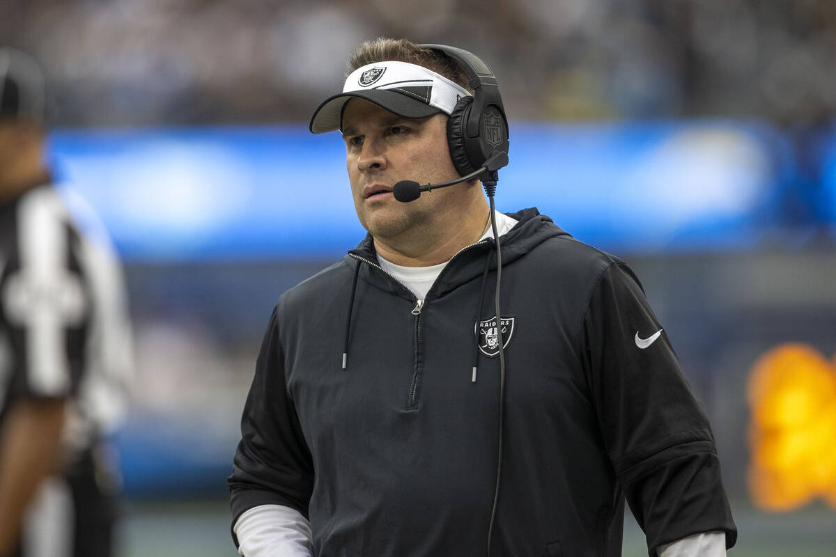 Raiders head coach Josh McDaniels looks on from the sideline during the first half an NFL game ...