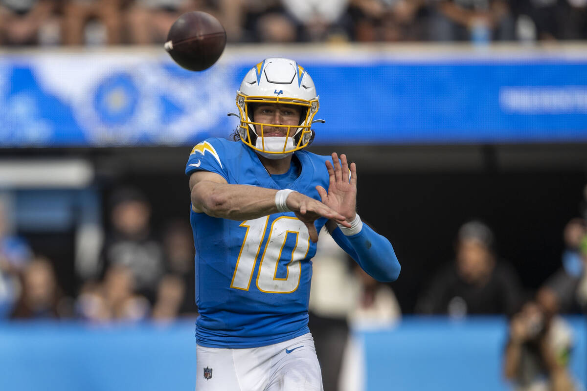 Los Angeles Chargers quarterback Justin Herbert (10) throws during the second half an NFL game ...