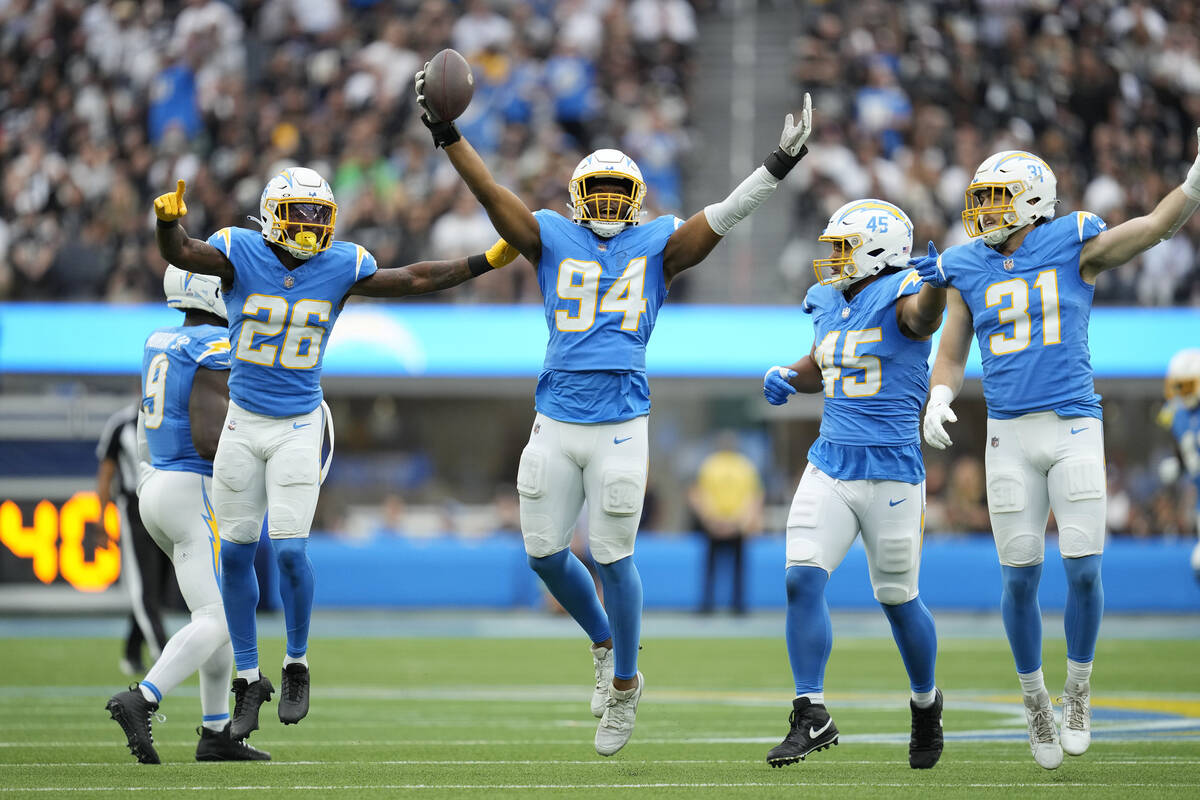 Los Angeles Chargers linebacker Chris Rumph II (94) reacts after recovering a fumble against th ...