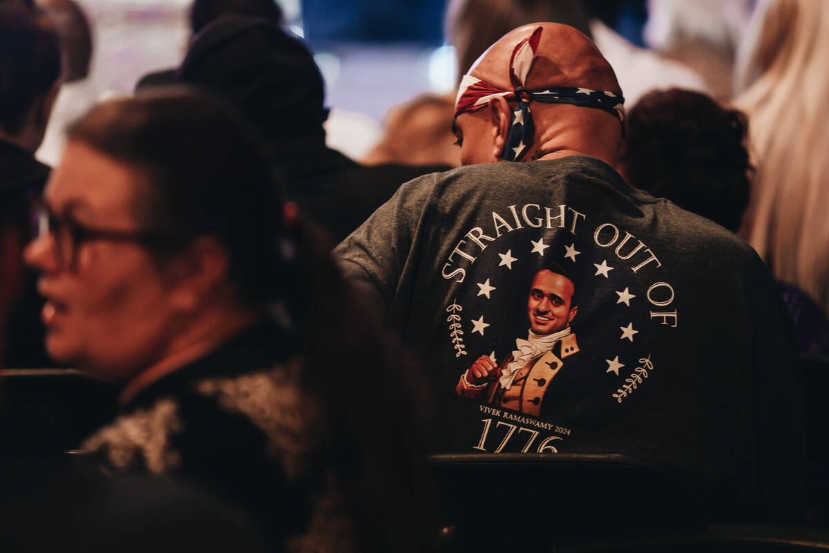 A Vivek Ramaswamy supporter waits to hear him speak at an event at Stoney’s Rockinȁ ...