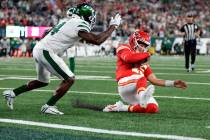 Kansas City Chiefs quarterback Patrick Mahomes (15) slides inside the five yard line ahead of N ...
