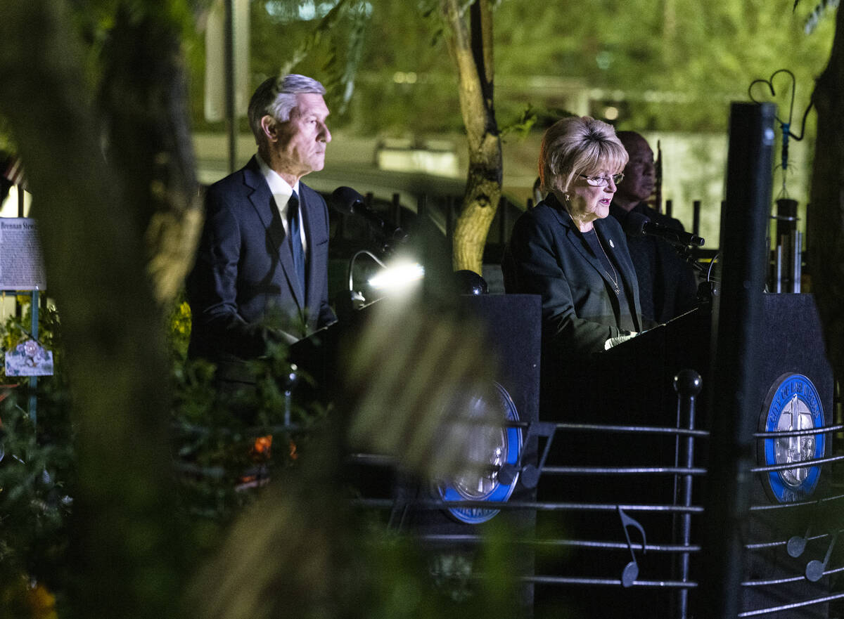 Mayor Carolyn Goodman, right, and David Riggleman, Las Vegas communications director, read the ...