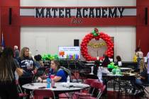 Teachers wait for a training session at the charter school Mater Academy of Nevada in Las Vegas ...