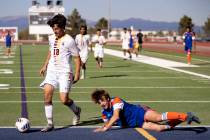 FILE - Eldorado’s Luke Ostler (18) steals the ball from Bishop Gorman’s Chase Stewart, righ ...