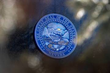 The Great Seal of the State of Nevada adorns the Nevada Legislature building on Wednesday, Feb. ...