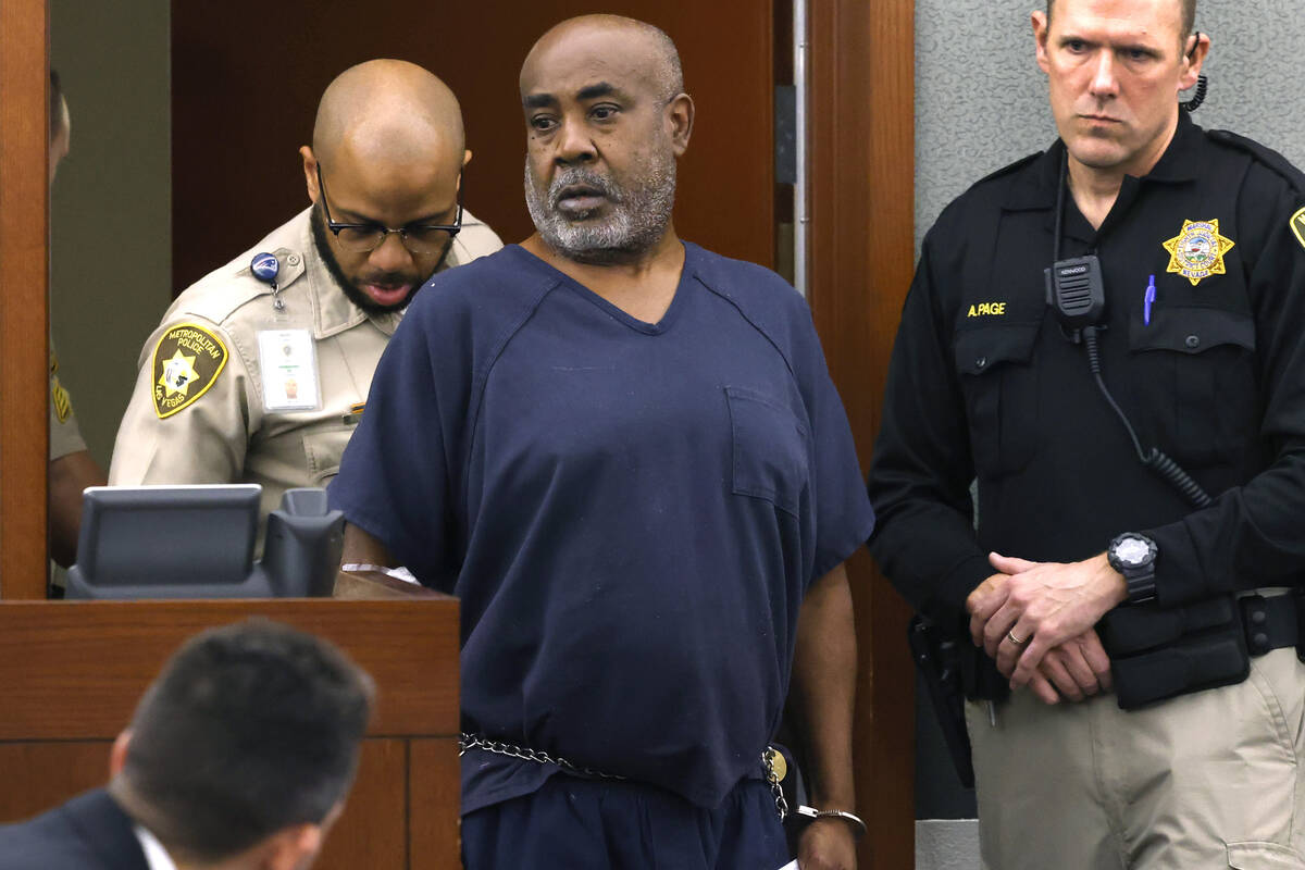 Duane Davis, accused of fatally shooting rapper Tupac Shakur in 1996, is led into the courtroom ...