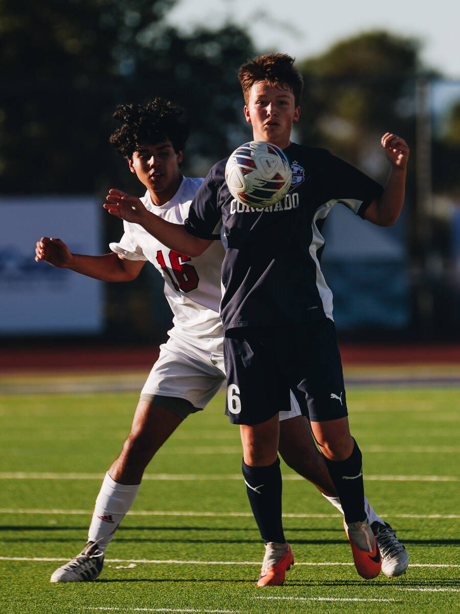 Coronado’s Aiden Sena (16) jumps up to head the ball during a game against Arbor View at ...