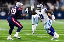 New England Patriots offensive tackle Vederian Lowe (59) blocks Dallas Cowboys linebacker Micah ...