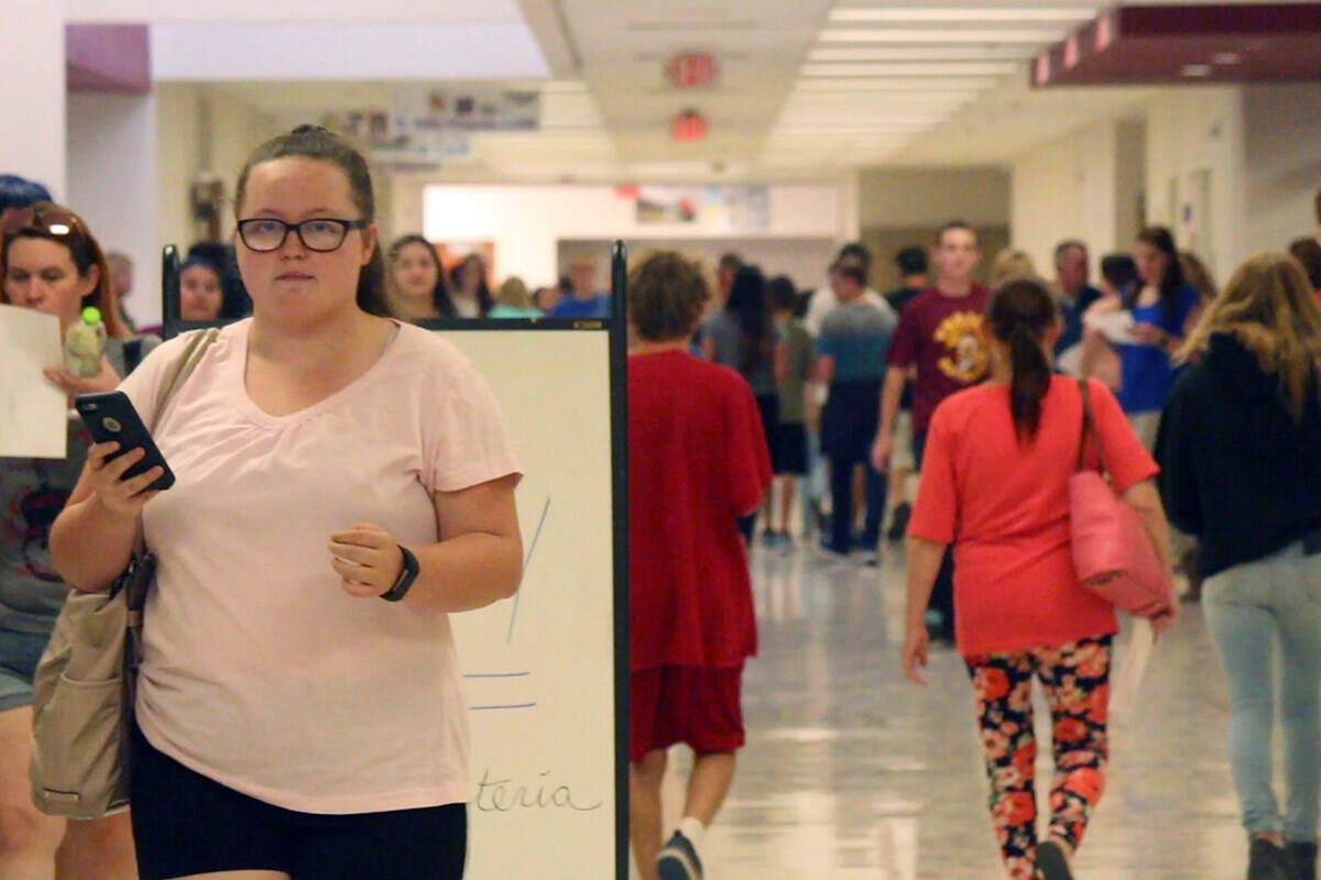 Students walk through the hall of Pahrump Valley High School. (Jeffrey Meehan/Pahrump Valley Times)
