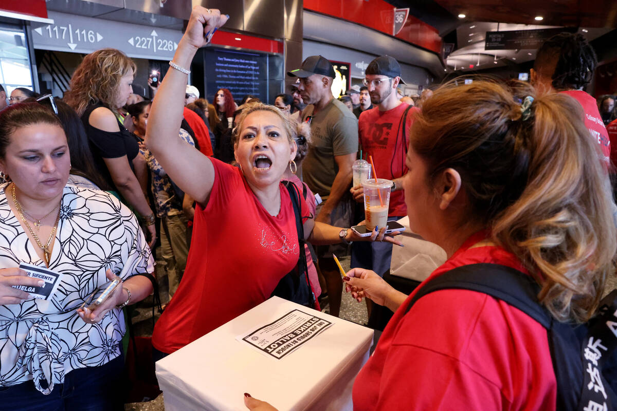 Culinary Local 226 members, including Veronica Flores Serrano, who works at The Linq, cast thei ...