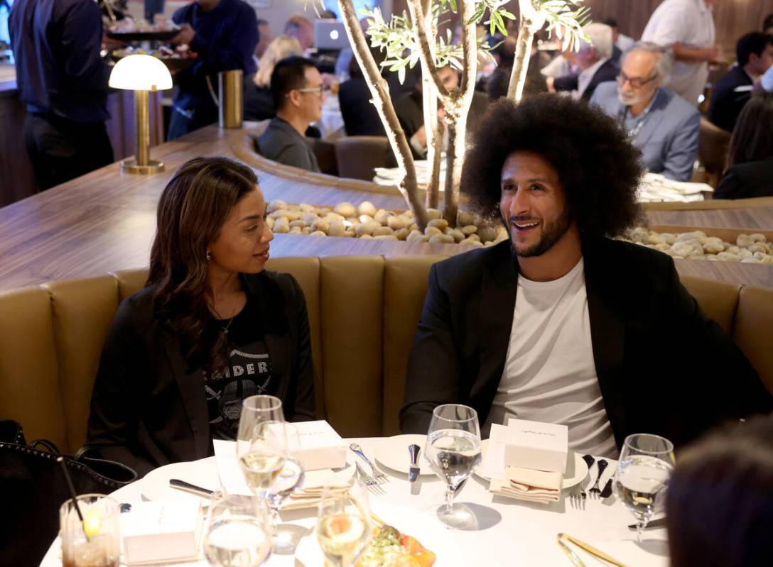 Raiders President Sandra Douglass Morgan mingles with social activist and former NFL quarterbac ...
