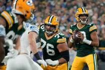 Green Bay Packers' Jordan Love throws during the first half of an NFL football game against the ...
