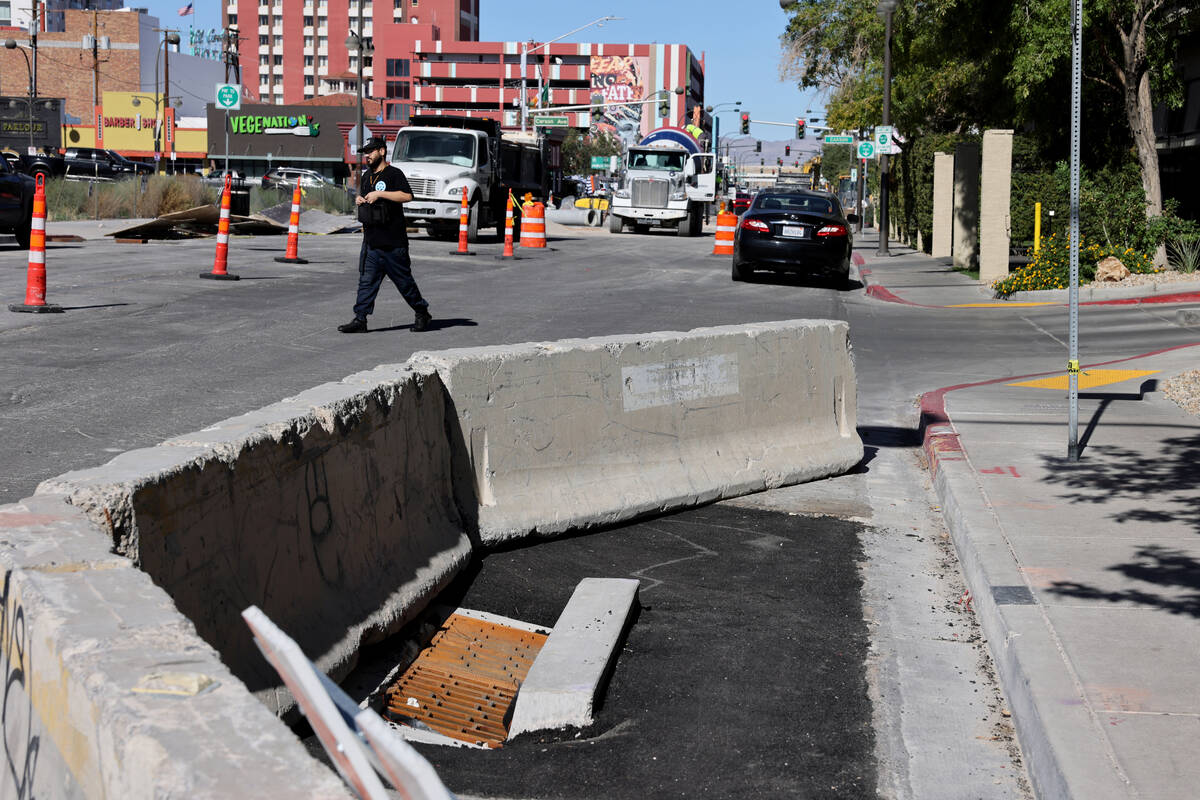 A pedestrian walks on Seventh Street between Bridger and Carson avenues in downtown Las Vegas a ...