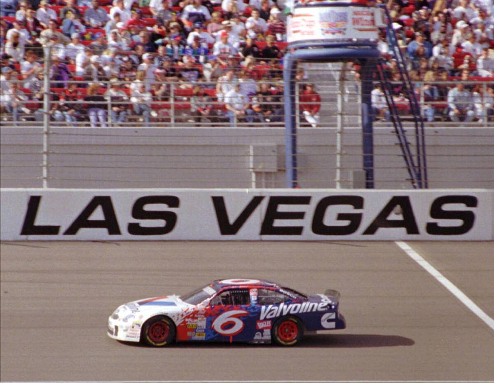 Mark Martin takes the checkered flag at Las Vegas Moter Speedway in 1998. (The Associated Press)