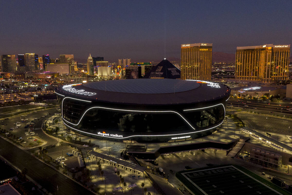 An aerial view of Allegiant Stadium and the Las Vegas Strip at dusk on Thursday, January 6, 202 ...