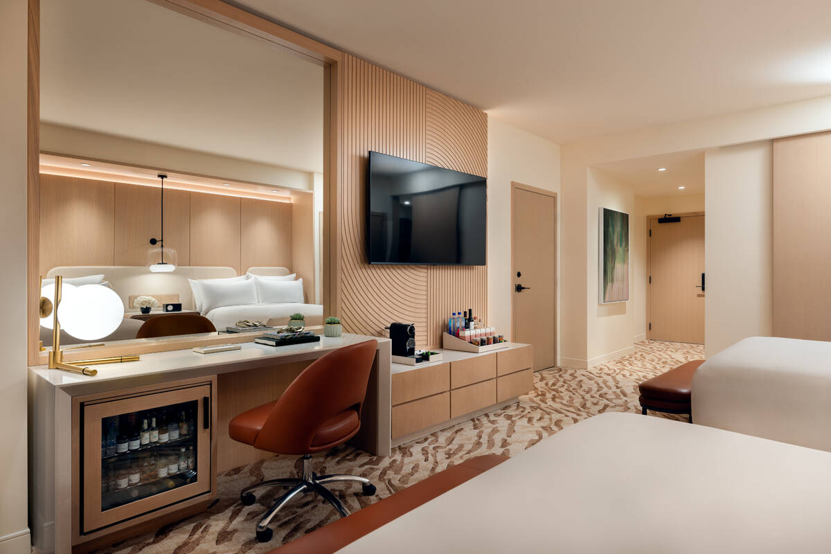 The desk and mini bar in a double queen room at Durango Resort. Rooms can be booked for stays b ...