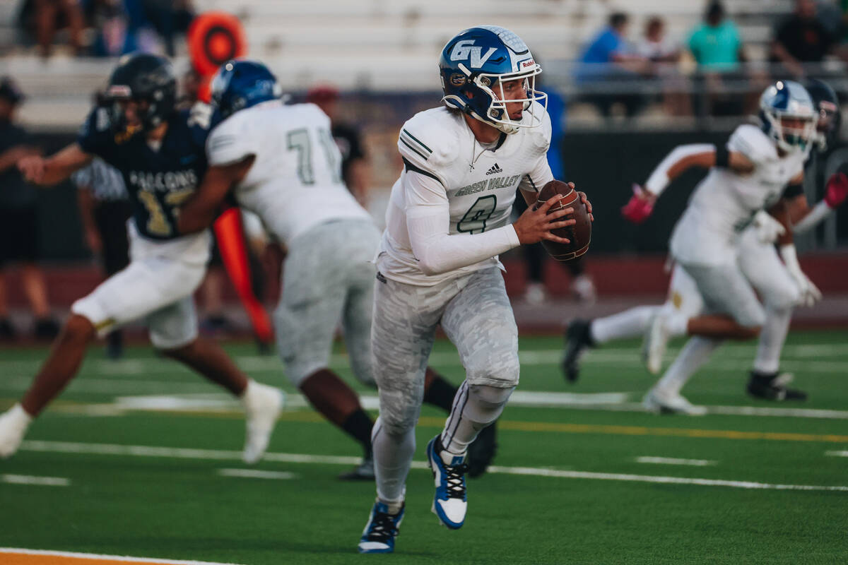 Green Valley quarterback Jack Thow runs with the ball during a game against Foothill at Foothil ...