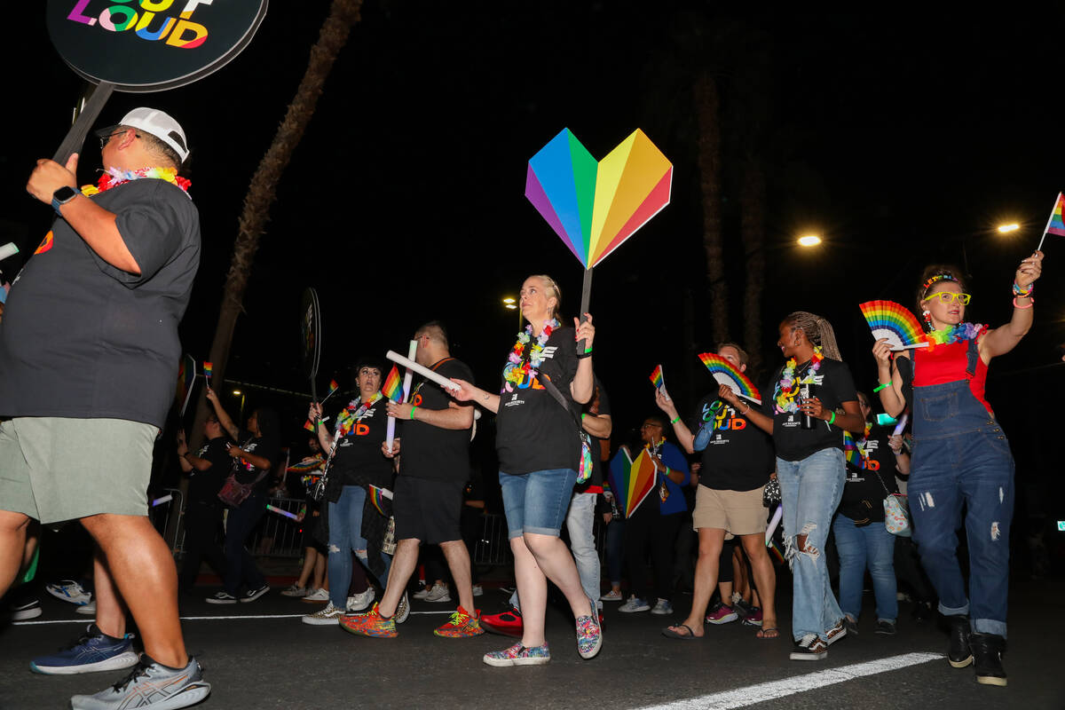 MGM Resorts employees walk in the Annual Las Vegas PRIDE Night Parade on Friday, Oct. 6, 2023 i ...