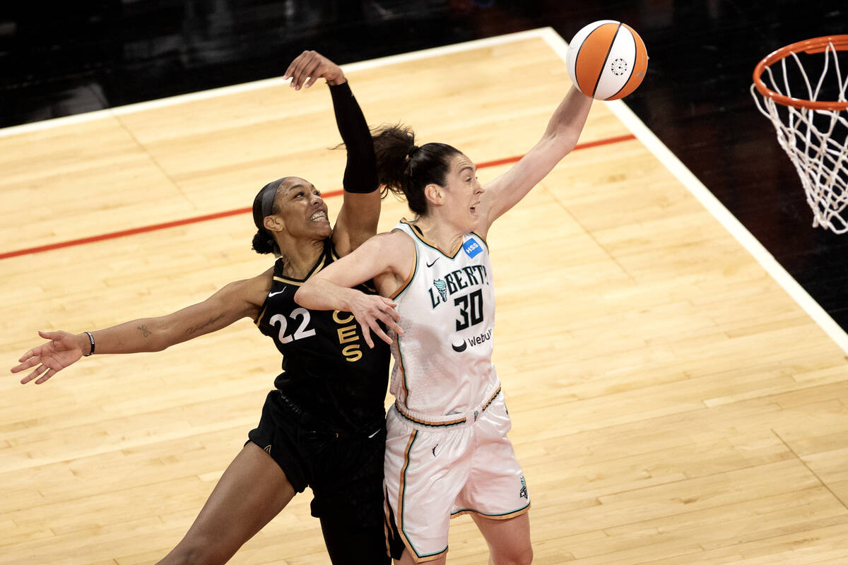 New York Liberty forward Breanna Stewart (30) shoots against Las Vegas Aces forward A'ja Wilson ...